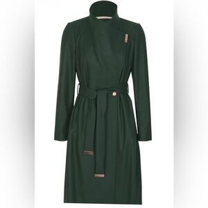 Dark green trench coat with rose gold tone hardware.